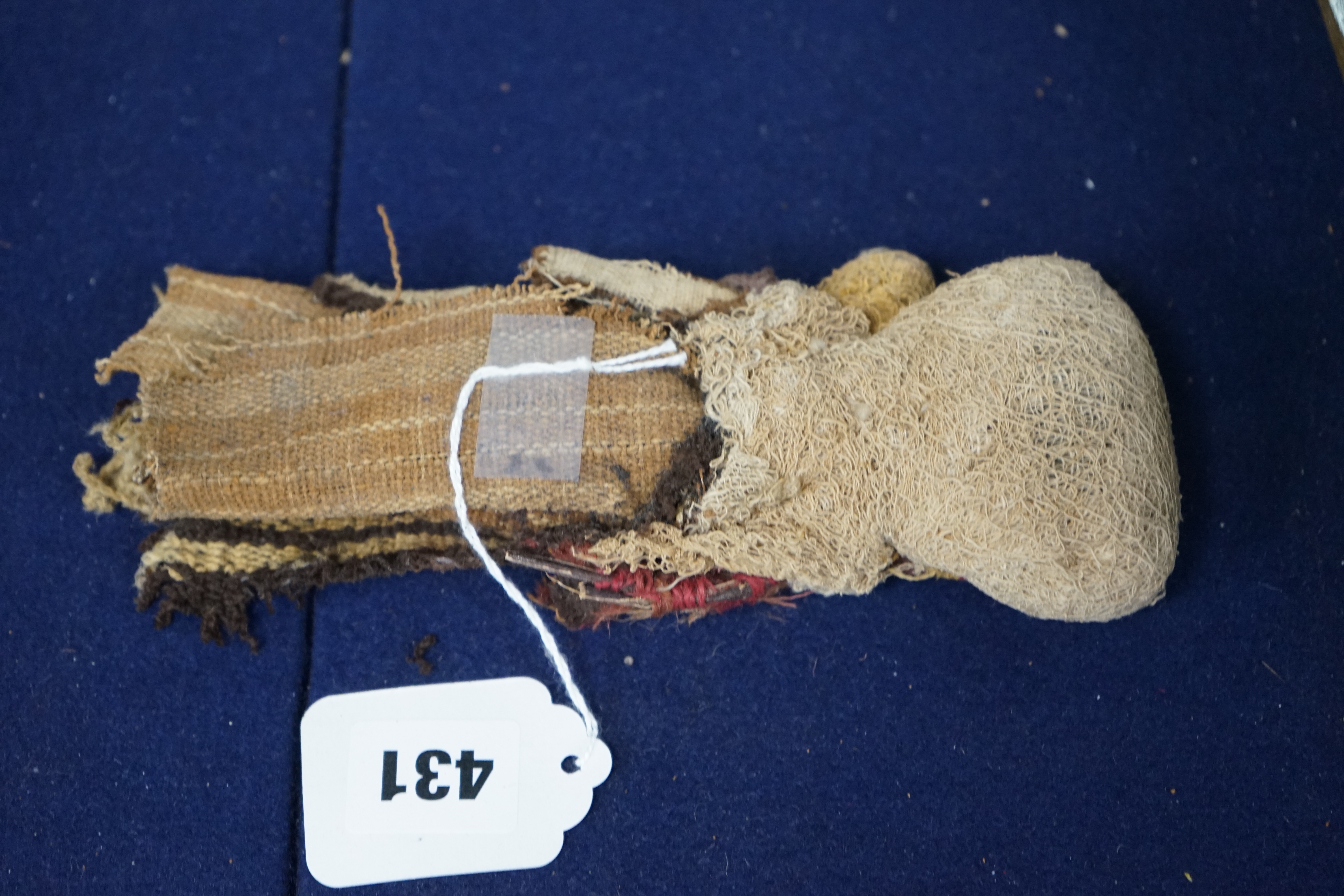 A pre Columbian textile doll, 20cm. Condition - worn as expected